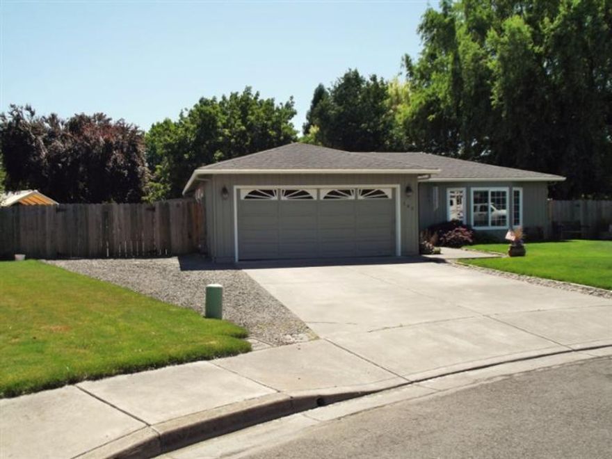 This is a great home on a quiet Cul-De-Sac on a huge meticulously landscaped .32 of an acre. Home has all new paint inside and out, new roof and backyard deck. This gem is well cared for and boosts granite counter tops in kitchen and bathroom with tile flooring. The master bath has been recently updated with tile and granite counter tops. There is an attached two car garage and an oversized R.V. parking area for all your client's toys. Wait till you see the oversized backyard with covered patio, deck and plenty of trees to enjoy those quiet summer evenings. There is also room for a hot tub with wiring available. Come see what makes this property the perfect place to call home!