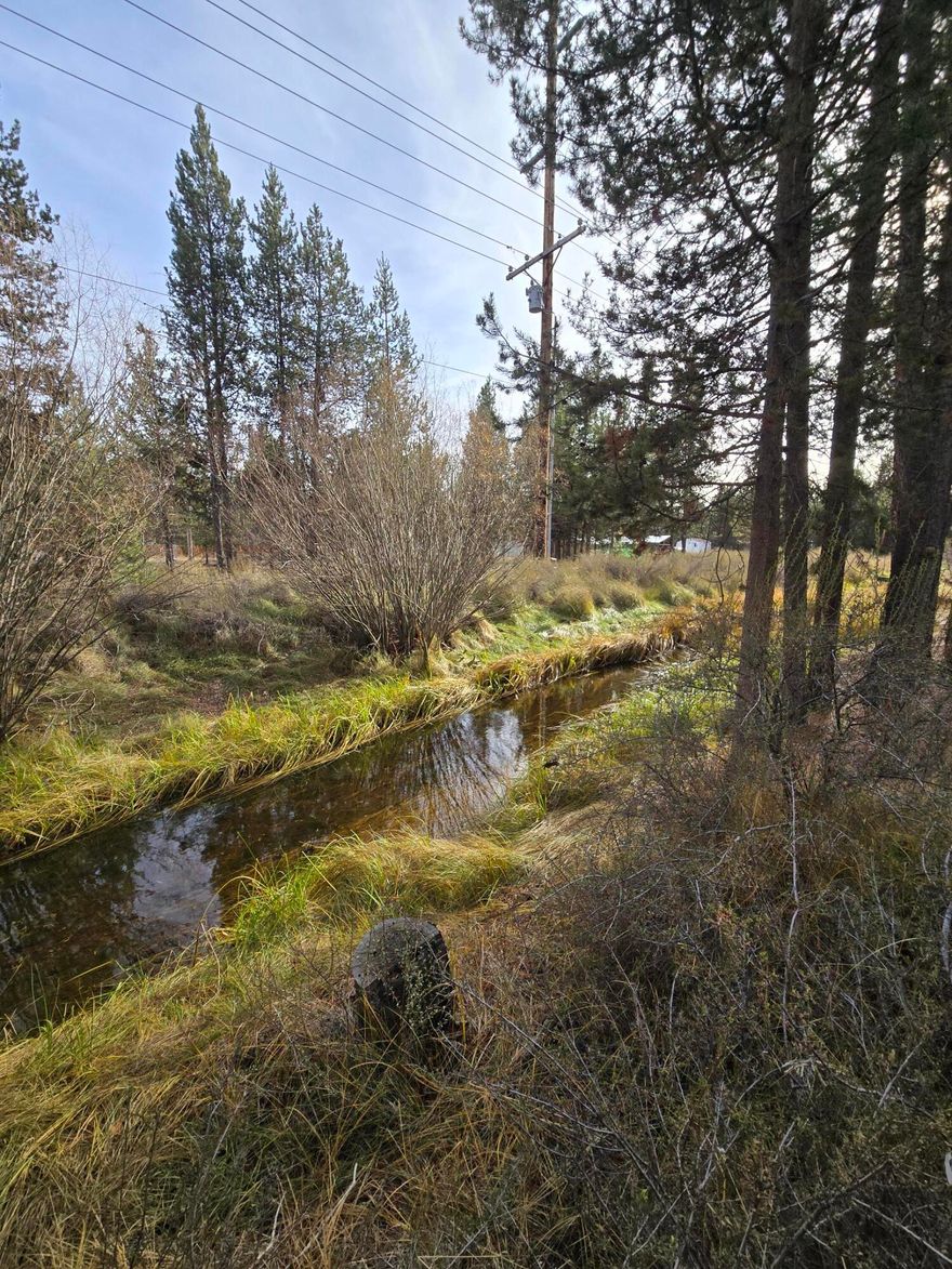 If you're excited build your home in Central Oregon, this property is ready for you! This 1.15  acre lot just 10 minutes south of La Pine is already equipped with electricity, RV hookups, septic and well.  With a canal that runs on the edge of the property and tall Ponderosa trees that are native to the area, BLM land and hiking/biking/ATV trails, lakes, mountains and the gorgeous Deschutes River minutes away-this property is in the ideal location to enjoy all that Central Oregon has to offer year-round. Make La Pine your home (or your home away from home) on this beautiful piece of land that is ready and waiting for you.