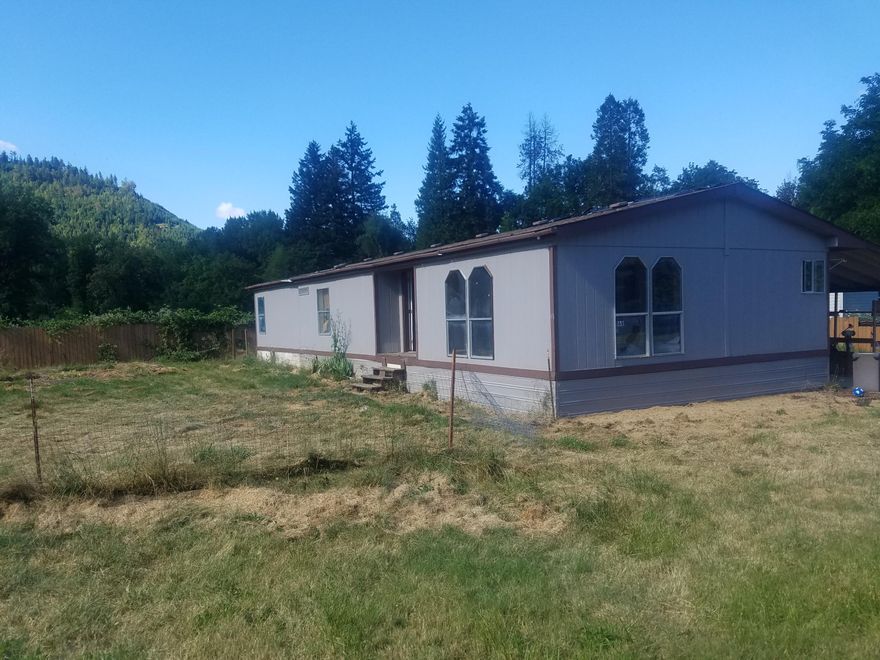 Located in a peaceful cul-de-sac in a quaint rural town between Grants Pass & Roseburg.
Built in 1992 this 1512 Sqft 3 bedroom 2 bath home offers a potential opportunity for the handy person or investor. Situated on .18 of an acre & partially fenced . Needs TLC being sold ''as is''.