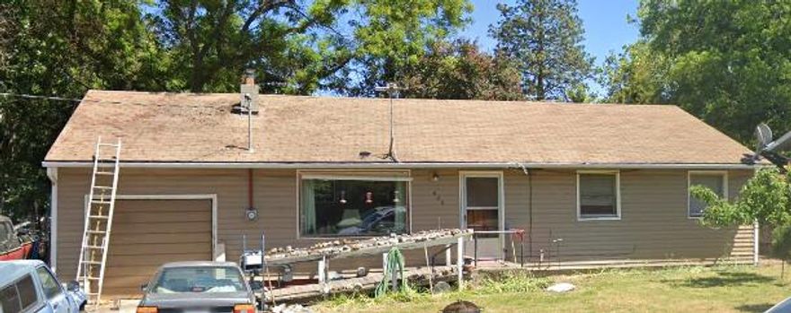 Great opportunity in a prime Ashland location. Tucked away on a quiet street surrounded by beautiful homes, this property is full of potential. With real hardwood floors under the carpet and having been in the same family for over 40 years, it's ready for new life. Perfect for a flip, rental, or your own dream home. With a little love, this could be an incredible place to call home in one of Ashland's most desirable neighborhoods