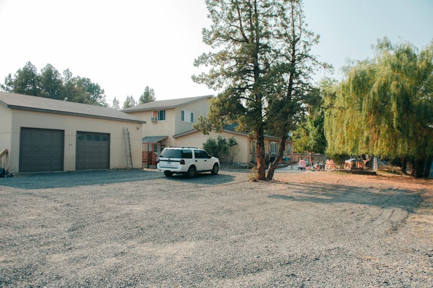 Needing a little elbow room? This home is located on a 2 acre corner lot in High Desert Estate. 5 bedrooms and 3 bathrooms with 2 master suits makes it perfect for a Large family. Lots of updates have been completed within the last year...kitchen, bathrooms, floors and much much more. A large 30x33 shop with 2 doors offers plenty of room for your toys.