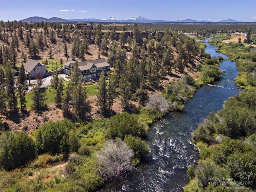 One of a kind Deschutes River Frontage with easy access from the landscaped yard to the river for fishing, boating & river activities. Incredible custom home on 10 private acres features: 5544 sq ft, two master suites, gourmet kitchen, living room, formal dining, craft room, two family rooms, full bar, bonus room, attached 3 car garage. Additional detached shop/garage is 2220 sf. Property is close to BLM. 10 minutes from town, 15 minutes to airport. A wonderful home for family or weekend retreat!