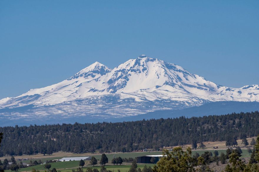 Looking for a beautiful Cascade view lot to place your new manufactured home, relocate your, not-so-new manufactured home or build your new custom home?  Either way, this lot is exactly what the Doctor ordered.  Services are installed on this slightly sloped lot.  Just remove the single-wide and voila, your homesite is at the perfect place to enjoy the westerly Cascade views!  The value is in this improved, view lot.  Single-wide has no added value.