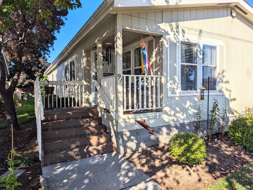 An inviting covered porch welcomes you into this comfortable 3 bed, 2 bath,1446 sf home in very desirable Snowberry Village 55+ Mhp.  Well maintained with key updates since 2011 including a new roof and skylight, new laminate flooring in the kitchen and dining areas, and a new heat pump and water heater. The roomy kitchen features a new refrigerator, pantry and plenty of counter space. The primary bedroom is spacious, with the ensuite bathroom upgraded with new counters, sinks, faucets, and toilets. Also newer is the garage door opener and a repaved driveway. Sale is for the home only located in the highly sought-after 55+ community Snowberry Village, a beautifully maintained park close to shopping, restaurants, and medical facilities. The monthly space rent includes water, sewer, irrigation with automatic sprinklers, lawn mowing, yard debris pickup, street snow removal, and community center. RV storage and dump available.