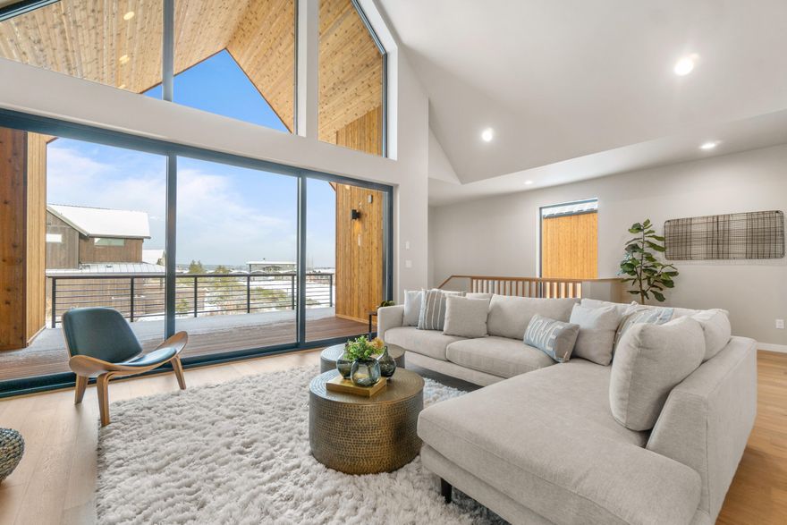 Welcome to Chalet, a collection of 12 beautifully designed reverse-living townhomes with a mountain modern aesthetic and a touch of European design. All of these stunning homes include fine finishes, modern lighting fixtures, and unique accents throughout. This Lodge floor plan (lot 27) home offers 2,494 Sq. Ft. of living space, featuring two full suites on the ground level and an owner's suite on the main living level. In the great room, entertain guests by the gas fireplace, or open up the panel of sliding glass doors to the expansive covered deck for easy indoor-outdoor living. Chefs will love the well-appointed kitchen, featuring a quartz island with breakfast bar and Thermador appliances. Chalet is conveniently located just steps from the new pool and all of the amenities of Tetherow Resort, and offers easy access to shopping and dining, miles of hiking and biking trails, and Mount Bachelor. *Images shown are of similar unit and for reference only.