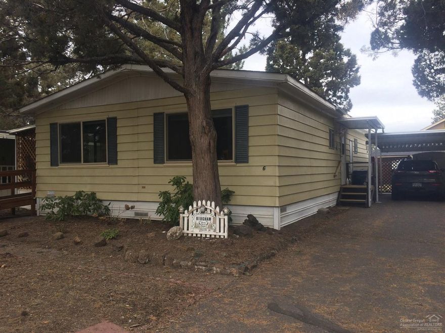 Nice small clean 55+ park close to hospital, shopping and medical offices. Fully fenced with 2 storage sheds and ramp. Newer carpet, hot water heater, electrical , lighting, tall toilets, and big shower head. Rosebushes and gorgeous flowers and vines in this park like setting back yard. Monthly space rent $415 which includes water, garbage & sewer. NO PETS ALLOWED