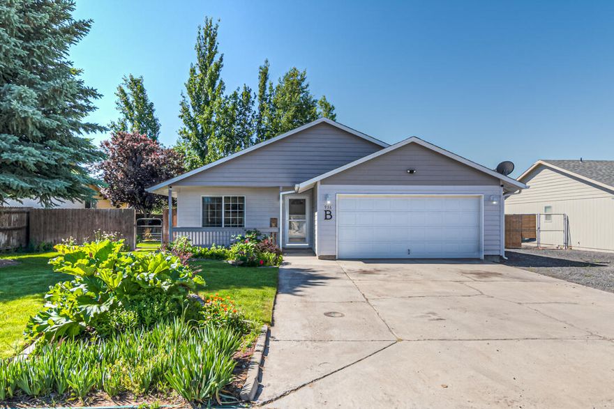 Welcome to this super cute and clean 1472sqft home in North Ridge. Beautiful front yard landscaping with a nice little covered front porch, walks you right into an open and spacious living room through the front door. Kitchen has new appliances, flows nicely right into the dining area, there is brand new luxury vinyl plank flooring throughout the house. Carpet in all three large bedrooms, master has it's own full bath. Lots of windows for good natural light, and window A/C units in each room to keep the house cool. Out back you will find a wrap around concrete patio with a fenced in yard, a storage shed, and RV parking to store your boat or trailer. Barnes Butte trail and neighborhood park are close by to enjoy as well. This home has it all!