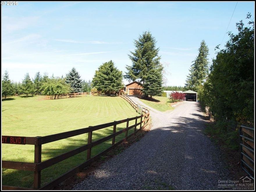 This home is Perfect for entertaining, inside or out!! Has a nice concrete Patio with Hot Tub. Very Private property. This home is on 2.6 Acres! Very Spacious, updated Ranch home. Large Great Room with a pellet stove, open floor plan. Large kitchen with quartz countertops & breakfast bar. Beautifully landscaped yard with firepit & Hot Tub. Huge Master opens right to the hot tub on the patio. Many Outbuildings, 2 huge shops, and plenty of storage! There is a Barn, storage building, RV Cover. Room for animals, you can grow your own food with the raised flower beds. The possibilities with this one are Endless!! This home is a must see home with all it has to offer!!