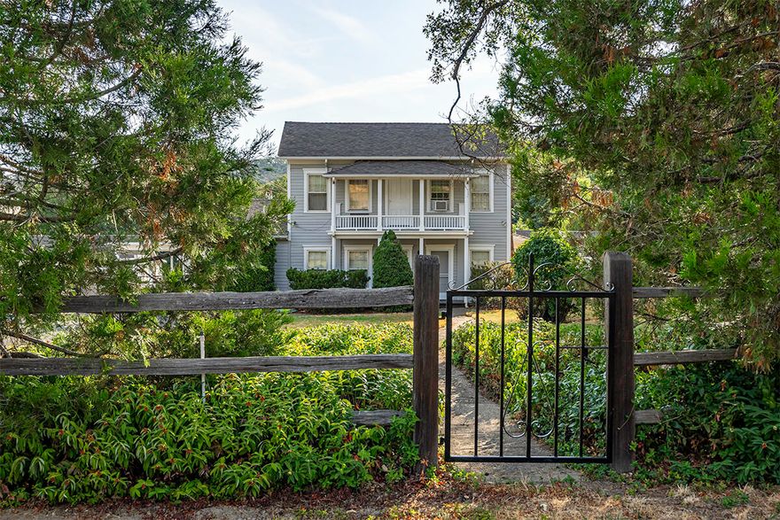 The Hugh Barron House stands just 1 mile up the Old Siskiyou Highway. One of the oldest homes in the area, this Classical Revival Style home, built in 1858, is situated on 33.76 acres with 26 irrigated. Large lawn areas, fertile pastures bordering Hill Creek, towering oaks & expansive views toward Emigrant Lake make an impressive setting. Wraparound deck & porch leads to the comfortable and authentic interior. Spacious main living with open living, dining & kitchen are welcoming & adjacent to the office & family room with brick surround for wood stove. The kitchen features red tile counters, Wolf range & large dining bar. Upper-level features 3 bedrooms & 2 baths. Separate 660 sf cottage built in 1900. Separate fixer double wide with own septic is holding additional homesite which can possibly be moved to another site on property. 3 car garage/shop. Pool not recently used. Well has 2200 gal holding tank & was 6 GPM at last test. Shed & old bunkhouse. Owner may carry.