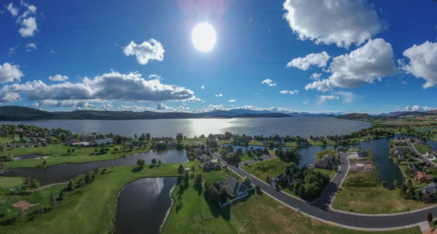 Beautiful home site on Harbor Isle Blvd. Walking distance to gorgeous views of the lake as well as Harbor Links Golf Course and Harbor Isle Fitness and Tennis Club. Water features near in 3 direction bring seasonal birds and lots of geese to the area. Peaceful views of golf course and water from back of property. Priced to move. Come find out if this is the ground you have been waiting for.