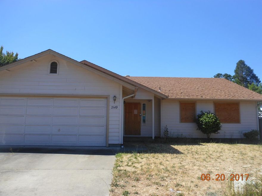 End of the road privacy. Three bedroom and 2 bath with bonus room off dining area.