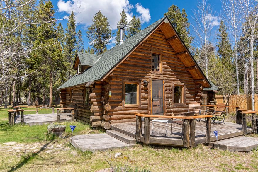 Peace and serenity await with this charming Scandinavian Scribe log home! Enjoy outdoor recreation, right at the end of your street, at the private HOA park and boat ramp along the Deschutes River. Close to Sunriver, Bend, Mt. Bachelor, Cascade Lakes, trails and more. Your first level includes a lovely living room with a high vaulted ceiling, dining area, kitchen, bathroom and spacious bedroom. Upstairs is a bedroom loft space with balcony access and a bonus room with storage closets to use as you wish. Washer and dryer are included in your laundry/pantry room. Outside features lots of deck space, new partial fence, two car metal carport, paved fire pit area, storage shed and beautifully landscaped and treed land. Option to obtain membership to Neighbors' Club with access to clubhouse (at end of street) and includes various monthly activities.