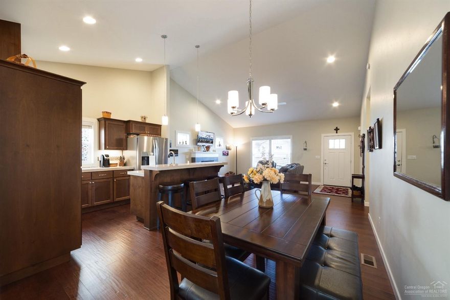 Sweet single level home truly is better than new! In pristine condition, this home has been lovingly cared for, and it shows! Quality construction by Choice 1 Builders, not even 2 years old. Designer selected finishes make this home a show place! Extensive use of wood flooring. Stainless steel appliances. You'll love the private backyard with pergola, fire pit and big patio. Energy efficient heat pump, window coverings, and beautiful landscaping saves you thousands over new construction. Don't miss it!