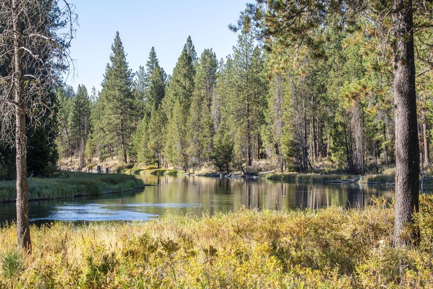 Experience Sunriver in unparalleled luxury, where breathtaking river views, serene privacy, and refined living blend seamlessly together. This exquisite 3-bedroom, 2.5-bath condo has been lovingly maintained by one owner since 2003 and offers direct access to the Deschutes River. Thoughtfully updated with new roof and recent upgrades, the layout is designed to perfectly frame the breathtaking surroundings. With a formal dining area, an open kitchen, and living room that all overlook the river, the beauty of the exterior landscape weave flawlessly with the sophistication of the interior.  The bedrooms are located on the 2nd floor, allowing for the privacy you deserve. The spacious back deck is where you want to spend your days, soaking in the stunning views and serene tranquility of the Mighty Deschutes. Located in one of the few Sunriver HOA's that does not allow for short-term rentals; this exclusive retreat offers privacy, sophistication, and the ultimate riverfront experience.