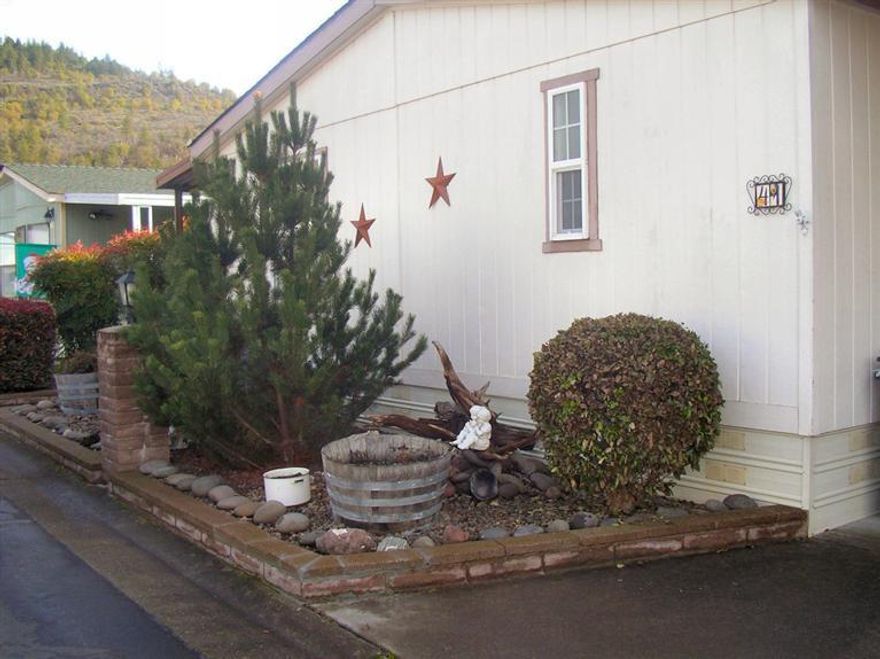 IT'S SOOOO CUTE! 3-Bedrooms, 2-bathrooms, vaulted ceiling, lovely front porch with mature shrubs for privacy. The backyard is nice size and plenty of room for garden area. Show & sell!
