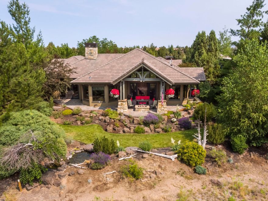 Beautifully executed, Timeless High Desert architecture in Pronghorn Resort. An open floor plan adorned with a lavish dream kitchen. Complete with an oversized island & breakfast bar. The great room boasts a stone fireplace & French doors lead to an amazing stone paver patio w/ views of the Nicklaus #10 fairway. Complete w/ gas fire-pit & ample space for entertaining. Other amenities include a roomy office w/ built-ins, the Primary Suite features a Gas Fireplace, oversized walk in-Closet & door to the patio to take in the sound of the water feature. The Triple Garage is 1460sf w/ a workshop area and room for all your Central Oregon outdoor gear. Take the walking path to the Clubhouse & enjoy a World Class Golf Resort community. Tom Fazio/Jack Nicklaus Signature Golf courses, Dining, Fitness Center, Spa, a 55,000 sqft Clubhouse w/ Members Club, Concierge Services, the Huntington Lodge Hotel. $115,000 Pronghorn Premier Club Membership included & transferred to a Buyer at Closing.