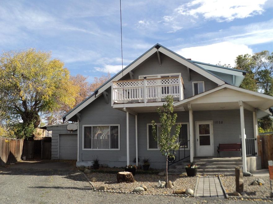 1910 Craftsman style- Lovely! Well maintained and updated 2562 sq ft . Each level has its own Bedroom and bath. Top floor is two bedrooms with huge master bath with walk in glass block shower and a cute deck off master for evening breezes. Office between bath and media room. 9 ft coffered ceilings in living, dining and kitchen. Galley kitchen is open to dining area and has 5 burner gas stove, stainless refrigerator with bottom drawer for fun cooking and great entertaining space. Gas heat. 3 blocks from downtown. Big fenced yard with full access to backyard for RV, boat, etc...and a 2 story fort! Oversized garage with shop area. Tons of off street parking. Super easy front yard maintenance!! Super sized evaporative cooler.