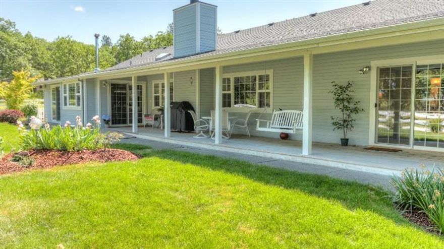 Gracious Country Property. This 2707 SF single level home was custom built w/3 bedrooms, a library with built-in book shelves, 2.5 baths, an open floor plan and wrap around porches. Prime location. The home is set back off the road on 6.32 picturesque acres w/white fencing & newly paved drive. Numerous trees grace the property. Splendid gardens and landscaping. Expansive shed for tools, firewood and tractor. 2 car garage w/adjacent private office. Separate Shop building boasts 1200 SF, 10 FT ceilings, hydronic floor heat, specialty lighting and 220 power. Main House features an open floor plan, vaulted ceiling in living and dining, island kitchen w/soapstone countertops and secondary dining area open to family room. Remodeled Master suite w/large wheel chair accessible shower, skylight, double vanity w/granite counters, new cabinetry, heated tile floors and 2 large wardrobes.