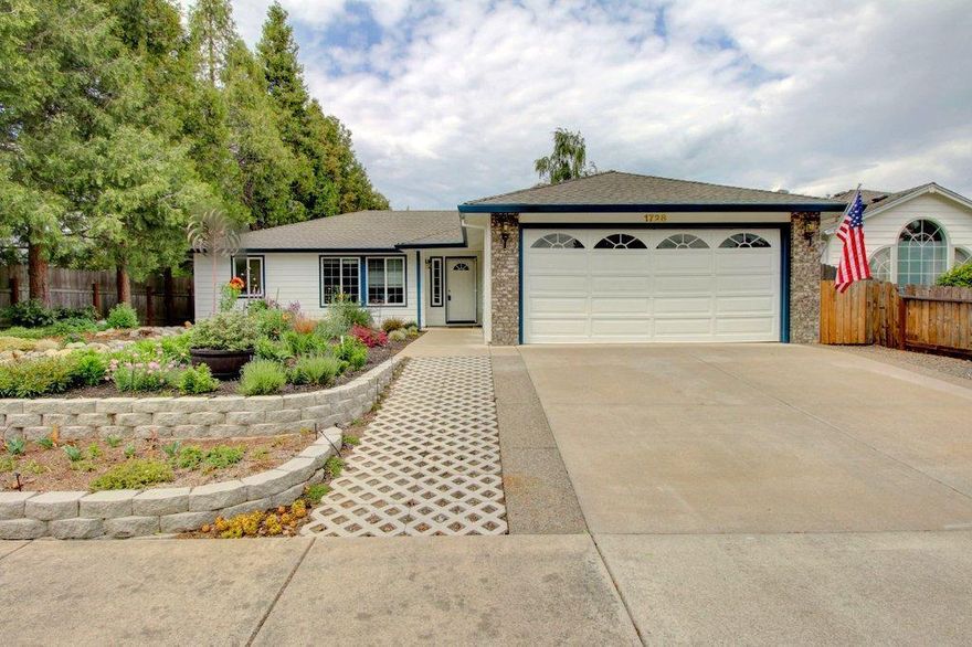 Inviting open floor plan awaits you in this single level three bedroom two bath home. Living room features vaulted ceilings, separate dining room, and large master suite with private bathroom. Attached two car garage. Entire front and backyard has undergone massive remodel/overhaul. Located in established neighborhood of nice homes and close to schools and shopping. Needless to say - this one won't last long!