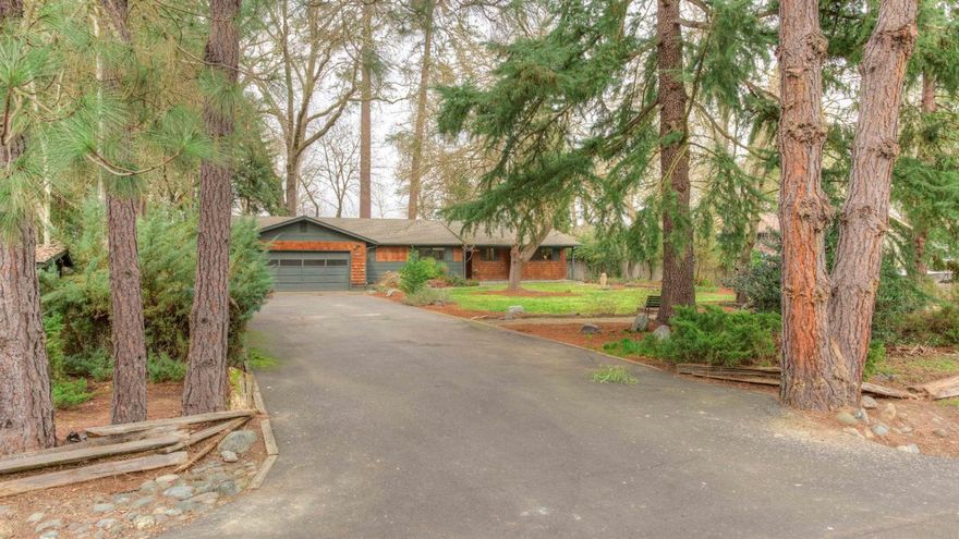 Tranquil Rogue River front setting on .46 acres is welcoming you home. Perfect opportunity to call this river front home your own. Updated home features 3 bedrooms, 2 bath with 2,078 sf. Step down living room with large picture windows to enjoy the river views, fireplace, slider to the deck and vaulted ceiling. Family room with built-ins, slider to the deck and cozy pellet stove. Kitchen with pantry, snack bar, instant hot water and hardwood floor. Master bath with tile surround and floor; sunken tub. Guest bath has been remodeled with beautiful tile. Large utility room with sink and lots of storage. All newer windows and heat pump in 04. Attached two car garage, storage shed and small RV parking. Beautiful mature landscaping, fruit trees, and just steps down to the Rogue River. Enjoy your picnic spot; this will become one of your favorite places to be. Relax on the deck with that morning cup of coffee; a great area for entertaining family and friends. Wired for hot tub. Virtual tour.