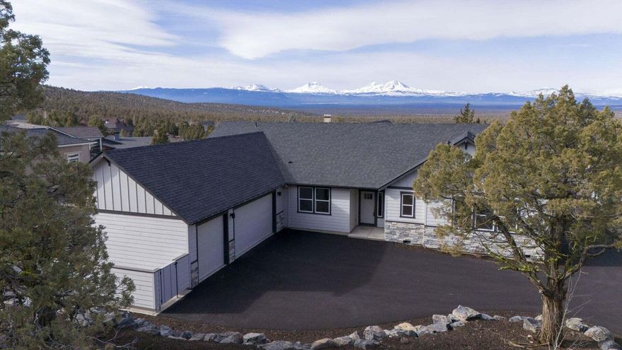 Beautiful New Custom Built Home! Open-floor concept plan includes Gourmet Kitchen with a large island, Granite counter tops, Under cabinet lighting. Top-of-the-line GE gas range/appliances. Two pantries and lots of cabinets. Doors leading out to expansive Composite deck with wonderful Cascade Mountains views. Hot tub ready, propane Barbeque hookup. Great for entertaining. Enjoy! Great room, has large gas fireplace with Custom built-ins. Vaulted Ceilings! Primary bedroom with extra-large walk-in closet, double quartz counter top vanity and tile shower. Three bedrooms, one is Suite with full bath. Formal Dining Room/Den or fifth bedroom, has 2 closets. Large Laundry room with built-ins. All-natural landscaping, low maintenance. Very private with an attached 700 sf triple-car garage that features a Hybrid hot water heater. Heat pump is a Carrier. Enjoy all of Eagle Crest amenities.