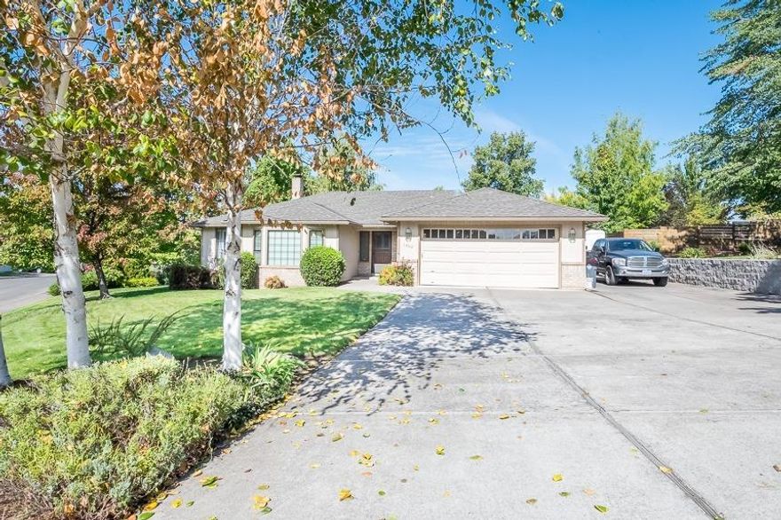 This is the house you have been waiting for! This home has 4 bedrooms, 3 full bathrooms, an office AND a smaller rec room. The family room is large with a coffered ceiling, ceiling fan and a fireplace. The kitchen was recently remodeled and offers tons of storage, granite counters and stainless-steel appliances. The master bedroom is spacious with a walk-in closet and remodeled bathroom which has a dual vanity and walk in shower. The 3rd car garage is insulated making it ideal for a gym. Huge lot with a peaceful private backyard, covered deck and RV Parking w/ full hookups.