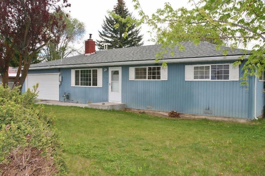 Super in the Suburbs! Wonderfully clean 3-bedroom 2 bath home with great floor plan, boasts newer paint & carpet, brand new laminate floors, updated bathrooms and all in attractive color schemes. Composition roof, vinyl windows, furnace & hot water heater are also newer, and located on a great suburban fenced lot with EID irrigation, 2 car garage & walking distance to Ferguson Elementary School. Move-in ready!