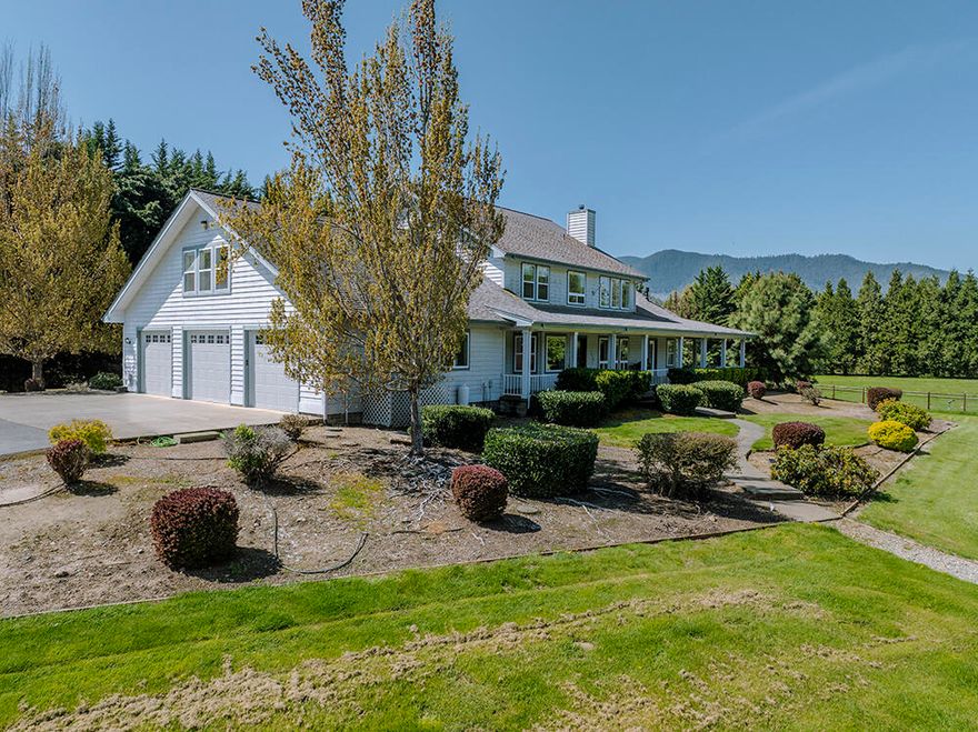 Exciting horse property on the Applegate River. Gated entry. Impressive 4400 SF custom home built in 2000. 3-car garage plus additional garage below caretaker's quarters. Open 4-stall barn w/storage & turnouts with shelters. Multiple pasture areas. Sand arena. Round pen. Covered RV parking. Area by the river has been parked out for relaxing. Irrigation rights from the Applegate River. This property is one of a kind. Call today for your personal tour, and welcome home.