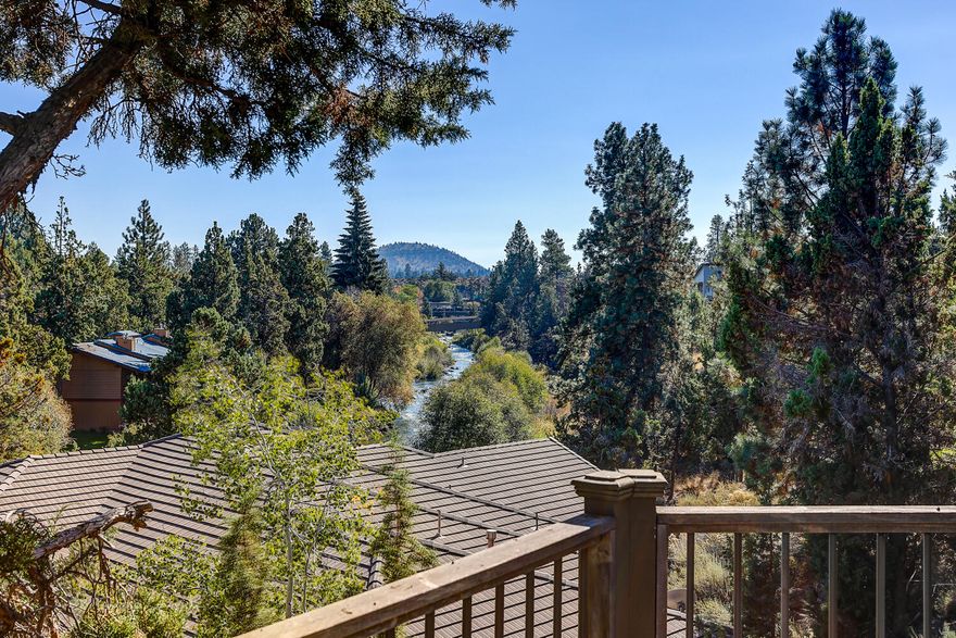 Exceptional Big Deschutes River Views in NW Bend! Located in the wonderful River's Edge Golf Course Community, large 3374sf home features: vaulted/open GR w/wood-lam floor, floor-ceiling dry-stack stone gas FP & River Views, open dining/kitchen w/gorgeous 3 inch slab granite counters, granite island/B-Bar, main level primary bedroom w/coffered ceiling, gas FP, huge walk-in closet, access to back viewing deck & private bath w/his-her vanities, jetted tiled tub & separate tiled walk-in shower w/pebble floor, large downstairs Family/Rec room w/full seated wet bar w/sink & refrigerator, pool table, wood-lam floor & river views + access to lower covered deck area, large upper mahogany deck w/incredible views of the river & pilot butte features a relaxing hot tub, big 1022sf attached 3-car finished garage features a generator ready power panel or add a EV charging station! The home is located across the street from NW Bend's premier golf course, owner access to Deschutes River & Sawyer Park