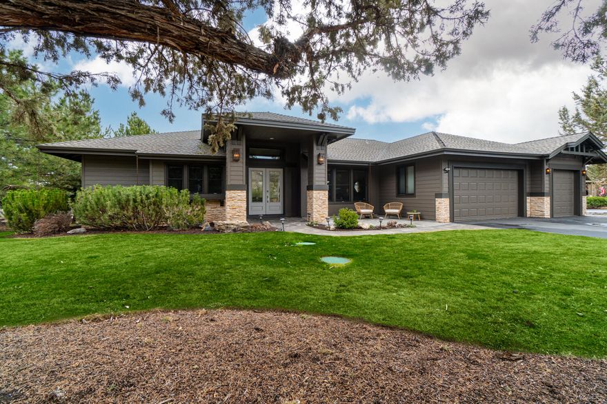 Gorgeous single-level contemporary in the highly sought-after gated community of Eagle Crest Resort! Great room floor plan with office and formal dining room. Soaring ceilings, travertine floors, built-ins, and gas fireplace. Entertainer's dream kitchen with large island, built-in buffet with china display, Viking 6 burner gas cook-top and downdraft, newer Samsung double ovens, new Panasonic microwave oven, and Fisher Paykel double-drawer dishwasher. Expansive deck and patio with beautiful autofill water feature and Marquis Resort Spa. Master suite with walk-in closet, large soaking tub, and walk-in shower. Two guest rooms; one oversized with sitting area and access to patio. Large three-car garage with huge overhead storage racks and new garage openers. Three exterior storage rooms, tankless water heater, new interior and exterior paint, and the heat pump was replaced in 2021.