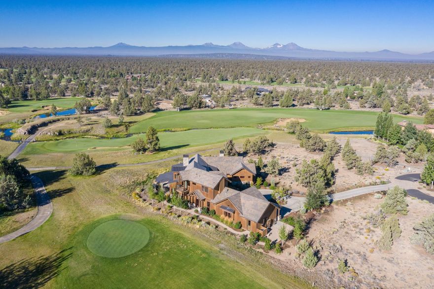 Soak in the Central Oregon weather from this amazing east to west facing property within the Pronghorn Resort. Custom built home by Blackrock Construction offers an open kitchen with Wolf & Sub Zero appliances, wet bar & large butler's pantry. The master suite with spa-like accents, a cozy office, plus a second guest suite can be enjoyed on the main level. The upper level offers a bonus space, 2nd office & the 3rd bedroom. Warm stone & hardwood floors, ceiling beams & designer details create an inviting, tranquil backdrop for the ultimate Central Oregon lifestyle, w/ 2 offices you can even work from home! French doors to patios from every room with covered patio, built-in BBQ & in-ground spa for sunsets over the Cascades. Oversized garage plus dog shower. Thoughtfully designed to focus on maximizing the beautiful views & fairways of the Fazio #6 & #7. Cozy up next to the outdoor fireplace & take in the sunsets. Seller will include $60,000 credit towards the Pronghorn Club Membership.