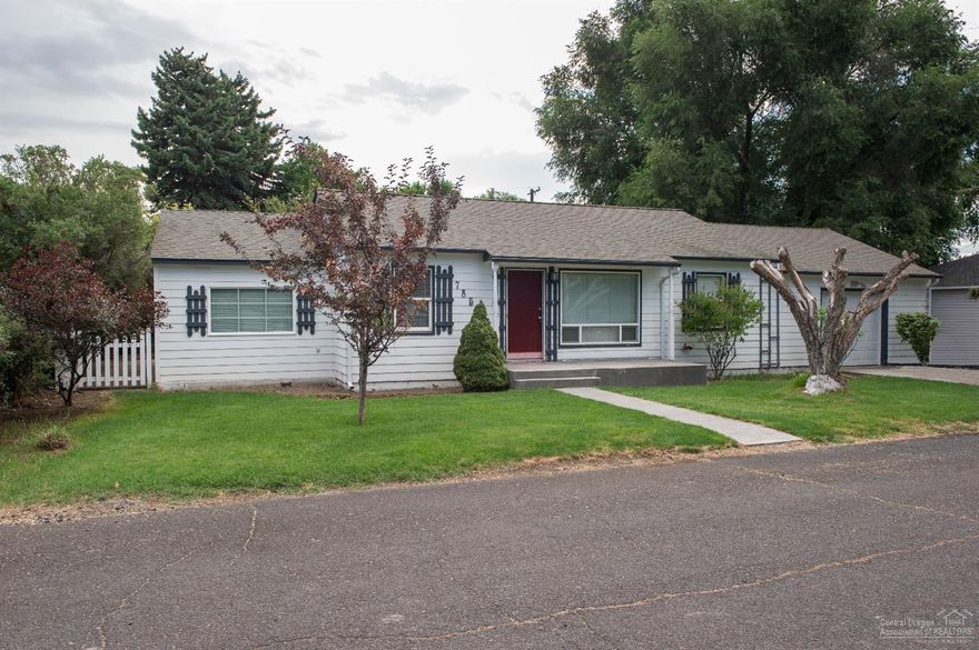 Location, Location, Location! Enjoy the quiet neighborhood and conveniences to town, schools, fairgrounds, and the local hospital. This 3 bedroom house with family room, has been upgraded to include new roof, new vinyl windows, new paint, new flooring, etc. Enjoy your backyard privacy for your year round BBQ's under the covered patio. This home is beautifully landscaped with mature trees, perennials, and a water feature in the backyard. Move-in Ready!