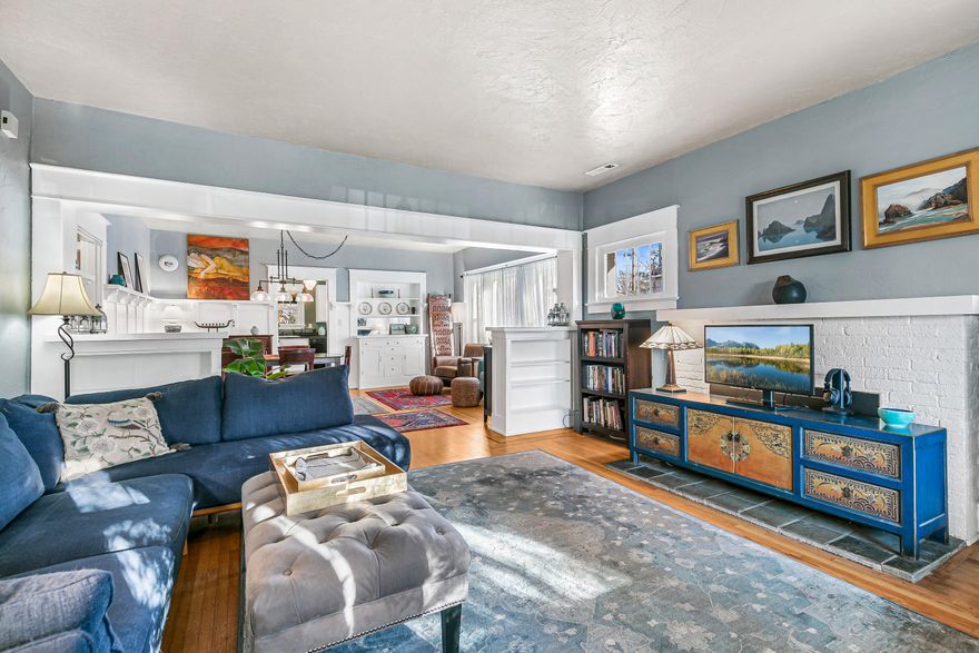 This beautiful craftsman home has been immaculately well cared for with true pride of ownership. The 3 bedroom, 1 bathroom home is filled with natural light and a cozy warmth throughout. Tall ceilings enhance the sense of space, while large, walk-in closets provide exceptional storage. The home has been thoughtfully updated with modern appliances and a newer heating and air conditioning system for year-round comfort. Outside, in your private backyard, enjoy a landscaped, yet low maintenance yard. A wonderful blend of classic charm and practical updates, this inviting home is move-in ready.