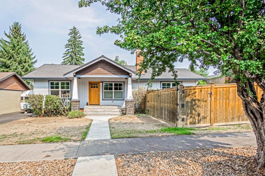 Very rare double lot in the heart of Bend's desirable westside.   Just a short distance to downtown and Bend's most popular restaurants and pubs.   Families will love the proximity to schools and fantastic parks.    Recreationists will love the extra large garage (600 sqft) plus the off street parking for your toys/ van.   This 1920's home has historic charm with the bonus of substantial updates in 2014.  Open and bright with two living rooms and wonderful natural light.  Bring your green thumb and transform this huge side yard into your urban oasis.
