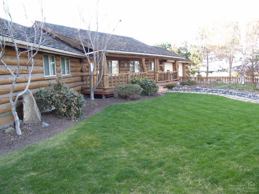 Beautiful Powell Butte farm property w/amazing Cascade Mtn views! Inc 1850 SF, 3 bed, 2 ba, well maintained log home, attached 2 car garage, underground sprinklers, paved driveway, 60'X36' shop w/mezzanine, equipment bldgs/covers, 8 tower irr. pivot w/25 HP pump, 55.8 ac irrig, 120'X60' hay storage bldg + more.