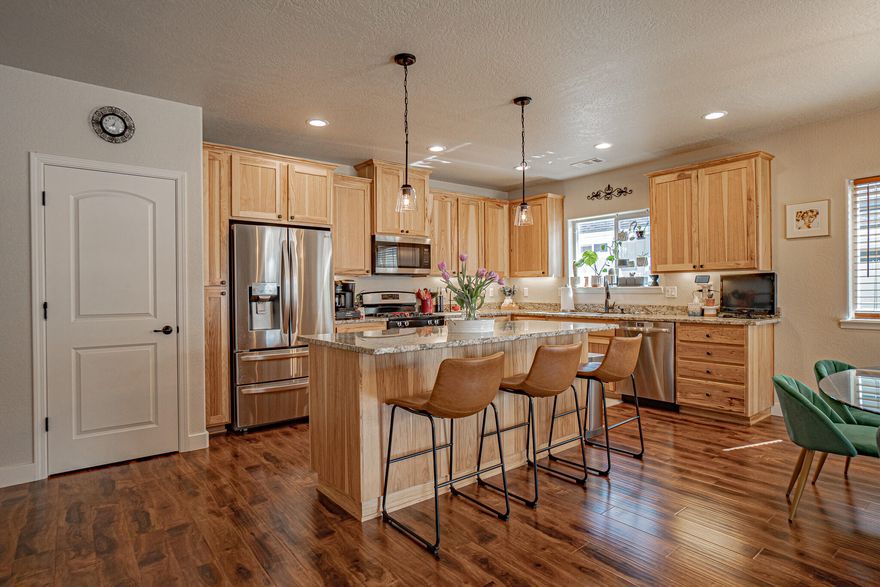 Like new home in a stunning neighborhood. This beautiful, meticulously kept, 2019 built home offers 1602 sq. ft. with 3 bedrooms, 2 bathrooms. The well thought floor plan has an Inviting entry, split floor plan and is open concept. The primary bedroom and bath offer dual sinks, walk in shower and large walk-in closet. The kitchen, opens to the dining and living room, offers granite counters with large island, custom hickory cabinets, a pantry, & stainless-steel appliances. The laundry room is spacious and has lots of storage. There's a spacious garage with an upgraded 8-foot-high garage door and no maintenance, white vinyl fencing. A few minutes' drive to the mighty Rogue River. Nice rural feel yet with city services and District 7 schools. Come see this one before it's gone!