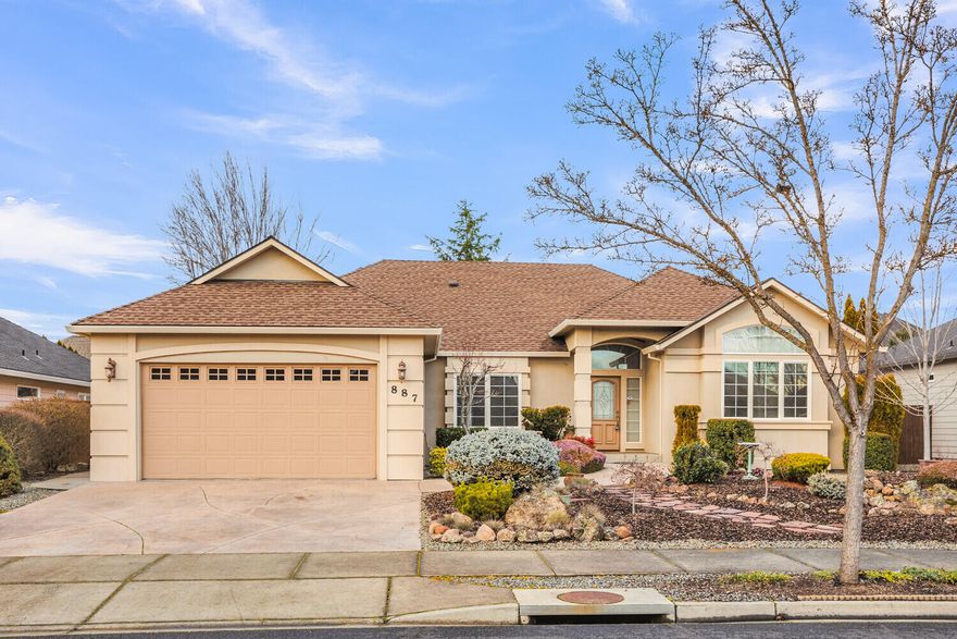 Beautiful Home located in the Eagle Point Golf Course community.  Well maintained single level home  features hardwood flooring, crown molding, office, living room with gas fireplace; formal dining room, nice kitchen with granite countertops and lots of cabinetry plus pantry.  Primary suite has walk-in closet and walk-in shower. soaking tub.  Fenced back yard with water feature and patio and has been professionally landscaped.  This home has great curb appeal!