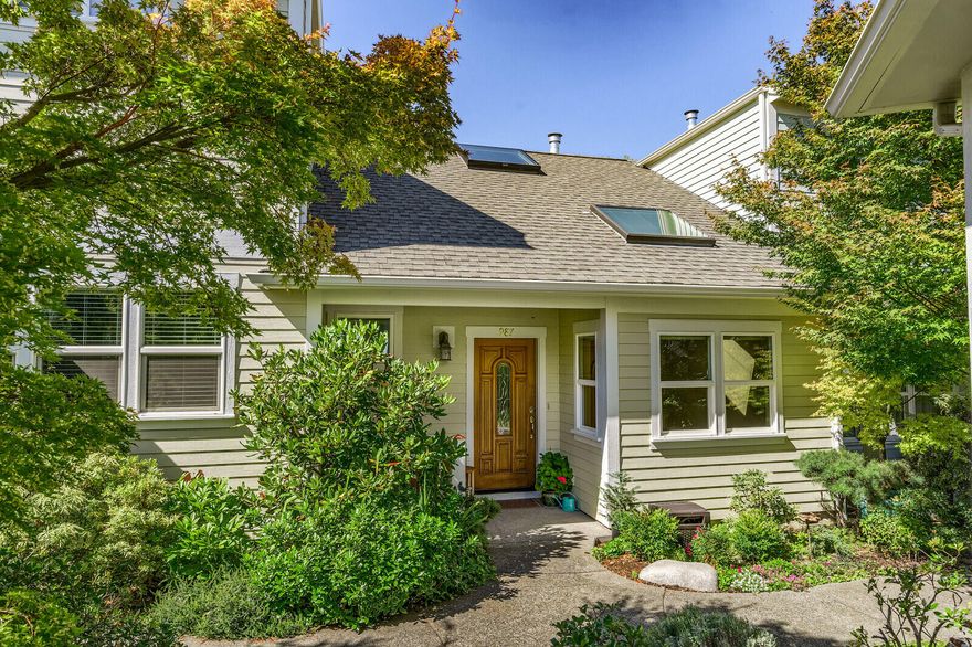 Clean and bright single bedroom townhome in highly sought after Railroad District. The charming Geneva Park Townhomes are known as a quiet garden community with a healthy association, and desirable location close to shopping, parks, and downtown Ashland. This quaint 1021 SqFt home enters to an open living space with high vaulted ceilings w/ skylights, cozy gas fireplace, nice big kitchen & dining area, and slider that leads out to a relaxing and private patio garden. Upstairs you'll find the gracious Owner's suite w/ walk-in closet, full bath, washer/dryer, and custom built-in cabinets w/ workspace. Enjoy easy living while listening to the soothing water feature in the immaculately maintained common space that also includes a heated lap pool, clubhouse, and large patio area. With dedicated parking, storage unit, and quick access to the Bear Creek bike path, peaceful and convenient Ashland living is rarely this affordable. Call for an easy appointment today!