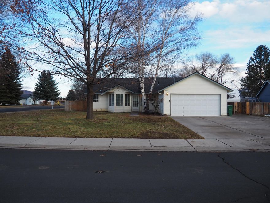 This home is a must see!  It is a great family home or investment property, which has been immaculately kept.  Spacious rooms, vaulted ceilings in great room, large kitchen.  Home has a nice floorplan with good flow.  Both bathrooms have a tub/shower combo.  Large corner lot location.  Roof replaced about 10 years ago, per seller.  Yard is large with raised garden beds, with automatic sprinklers in beds.  Automatic sprinklers in front and back yards.  Storage for large RV, with 50 amp hook up, behind gates.  Shed in back yard for your gardening tools. Two car attached garage has extra room for workbench.