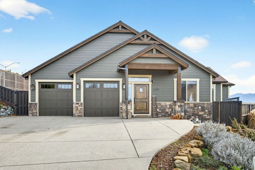 Stunning single level home in Bella Vista Heights with panoramic and incredible views of the valley, city lights and Mount Ashland. Built in 2021 on a spacious 0.79 acre fully landscaped & fenced lot. This home features 3 bedrooms, 2 baths, plus
flex/office/bonus room with double doors and views, vaulted ceilings and hardwood
floors. Gourmet kitchen offers a large island, quartz counters & tile backsplash, 5 burner gas cooktop, double oven (microwave combo), pantry & soft-close pullouts. Luxurious primary suite offers a vaulted ceiling, walk-in closet, custom built-ins & direct patio access, attached bathroom with dual sinks, dual shower, tile floors & quartz counter. Living room has a gas fireplace with custom built-ins. Enjoy the wide open backyard, all usable space, covered patio, hot-tub wire outlet & room to expand. Oversized finished
garage with a shop area, great attic storage w/pull down ladder. EV outlet. East Medford location, close to medical & conveniences.