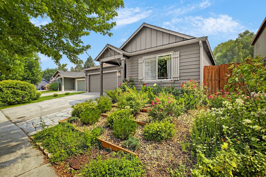 This charming single-level home has a wonderful open floor plan with vaulted ceilings, a wood burning stove, 3 solar tubes for natural light, a newer heat/cool system for comfort and efficiency, and solar panels to offset costs! You'll love the graciously sized primary suite with an accessible shower and walk-in closet. The home also has a dedicated laundry room, a newer convection oven, and ceiling fans. Outside you'll be delighted with the styling of the covered patio and mature landscaping. The fully fenced yard has a newer shed tucked in for extra storage and don't miss the fruit trees! Set in a popular neighborhood, it is close to schools and shopping as well as the Dry Canyon Park and Trail System and Sam Johnson Park. No HOA. This is a fantastic find!