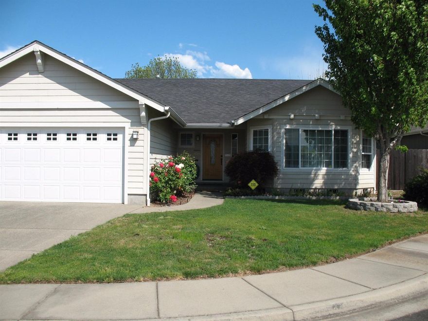 Welcome home to this well designed Jacoby built home on large lot sited on a nice cul-de-sac close to town. Enjoy the beautiful wood floors throughout, spacious living room with bay windows. Lovely kitchen offers pantry, eating bar with room for 4 opens to dining room area with bay window. Easy access to the covered patio with the best fenced backyard in town. Great water feature, easy to maintain established landscaping and separate garden area. Light and bright throughout. Sunny Master bedroom with walk in closets. All bedrooms have solid well designed closet paks--great for lots of storage! Separate laundry room with folding counter and additional cabinets. Attached finished 2 car garage completes this package! 35ft+ RV parking area.