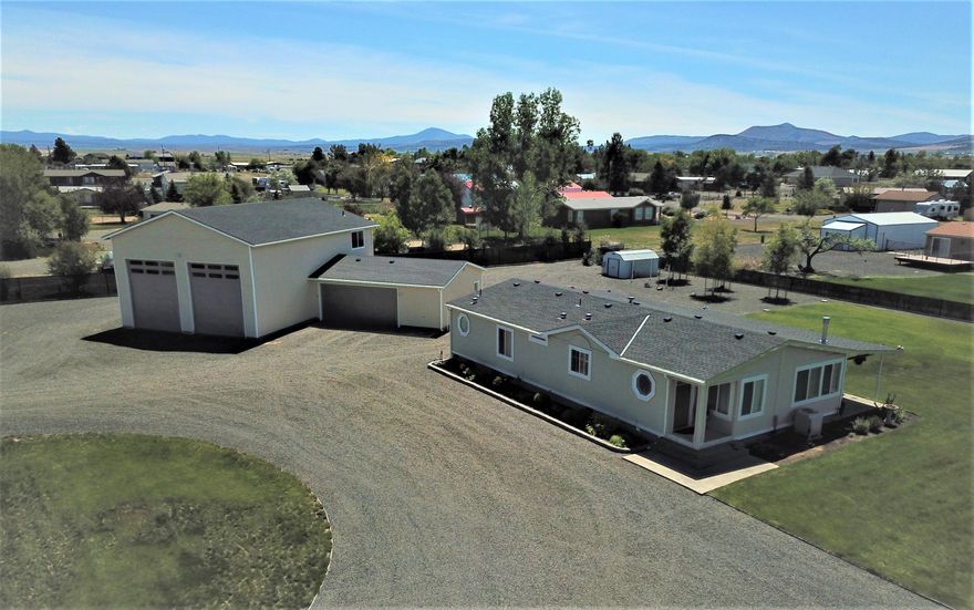 Quiet & pristine w/attention to detail on all levels. 1 acre manicured lot w/6 Cascade Mtn. views. 5 minutes to LBC/Cove Palisades put-in. 1849 total sf-home + over-sized detached garage & stick built shop. 2 BR, 3 Bath + office/exercise rm+media/mancave. Total property is move-in ready for entertaining inside & out. Full remodel inside, new roof, septic tank, plus huge polebarn/dbl garage/toy storage. Exquisite property for full-time or vaca living. Dbl detached garage is 32 X 24 extra wide and deep w/8.3 X 13.6 office/exercise room. Polebarns 48 X 32 w/2-14' high roll-up doors for toy/boat storage plus has enclosed loft area as media room/mancave. Sprinkler system, eternal lighting and so much more.