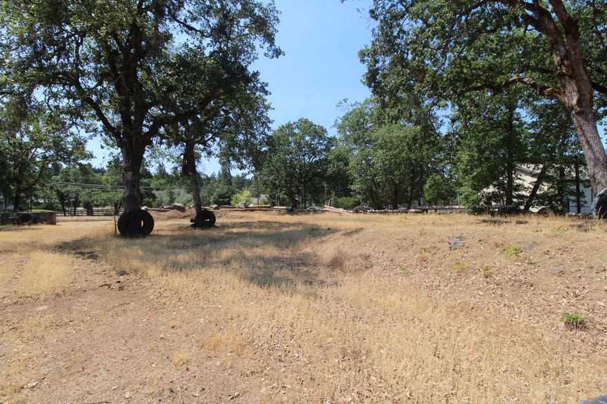 This property is comprised of three tax lots inside of the city boundary totaling 1.69 acres. This flat and open lot zoned single family residential could be the perfect home site for building or there is potential of having it rezoned to commercial being inside the comprehensive plan area (check with city for details). The three tax lots include: R330064 (.98 acres), R330066 (.65 acres), and R330067 (.06 acres).  Listed tax amount is the total of the three lots.
