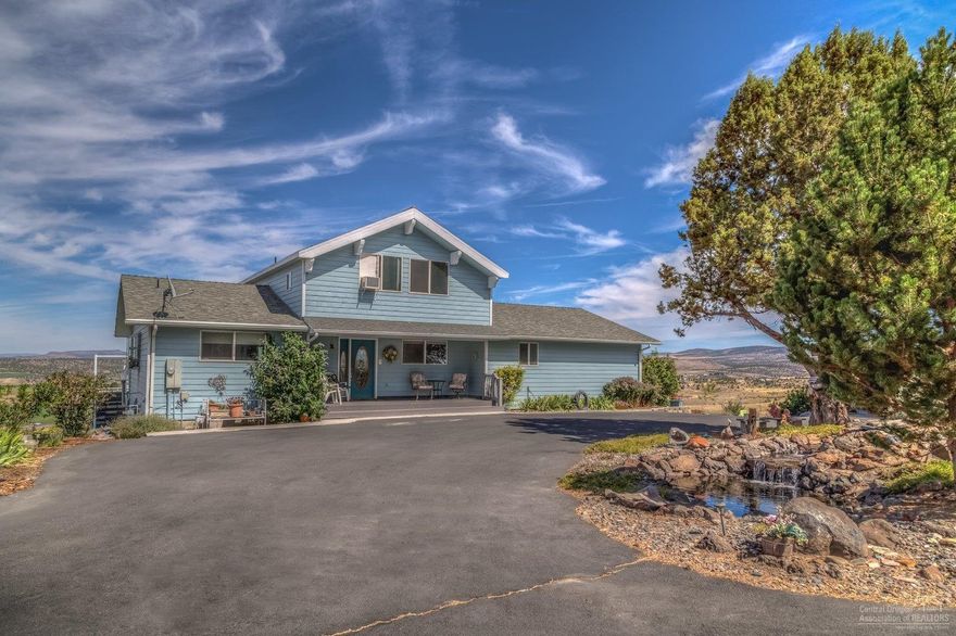 House on a hill, with amazing easterly views. This custom built home offers 3108 sq ft feet of vaulted floor to ceiling windows to maximize the views! Beautiful open loft area, fully finished walk out basement that could convert to more bedrooms or leave as is for bonus room area. Large Master located on main floor, full walk around deck, landscaped with underground sprinklers, circle driveway with large shop located on 1.2 acres. Located on a dead end road for lots of privacy! You will love this home!