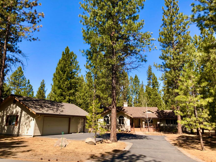 Experience tranquil days and star-lit evenings in this lightly lived-in, custom 3BR/2BA + family room home in the paradise community of Wild River at Pringle Falls!  Enjoy comfortable single-level living featuring a fireplace-focused family room for all seasons + separate living room w/woodstove when firewood beckons burning on cold winter evenings!  Meals are a joy to prepare in the well-appointed, sunny kitchen oriented to a dining area overlook of forested common area.  A large rear deck offers abundant outdoor BBQing opportunities, framed by groves of picturesque old-growth ponderosas.  The detached 864 sf double garage + bonus shop area offers multi-purpose convenience for the outdoor sportsman or woodworking hobbyist.  This special offering is located in an unparalleled riverfront community setting with coveted proximity to Central OR high lakes, Mt. Bachelor skiing, renowned golf courses, Sunriver recreation, and sought-after entertainment in lively Downtown Bend!