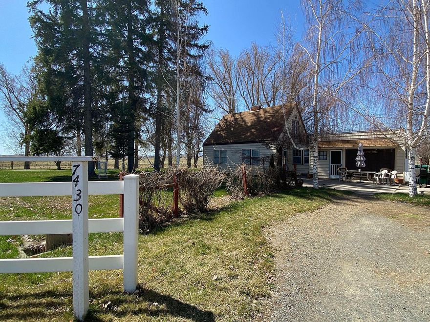 Sellers motivated-BRING OFFERS. Irrigation well on beautiful 112 acre farm/ranch with cute farm house! Perfect split of farm and ranch land. Fenced and crossed fenced to keep about 25-35 head of cattle on the green pastures and farm the fields for hay in the winter (3-5 ton/acre previous alfalfa yields). Property Bonuses: 450-500 gpm irrigation well and Class A irrigation rights, horse & hay barn, 30x40 machinery shop with engine lift with wood stove & natural gas heating, corrals & poultry pens. Home Bonuses: 2011/2012 kitchen & bathroom remodels, original built-ins, cold storage, pantry/laundry off the kitchen, and central natural gas heat/air installed in 2019. Home boasts 3 bedrooms and 2 bathrooms (one attached to first level bedroom). Things on this property have been well taken care of: House rewired in 2006, irrigation well recertified in 2018, septic tank pumped in 2020. Must see to appreciate! Home warranty is included. Accepting FSA and other Farm/Ag loans.