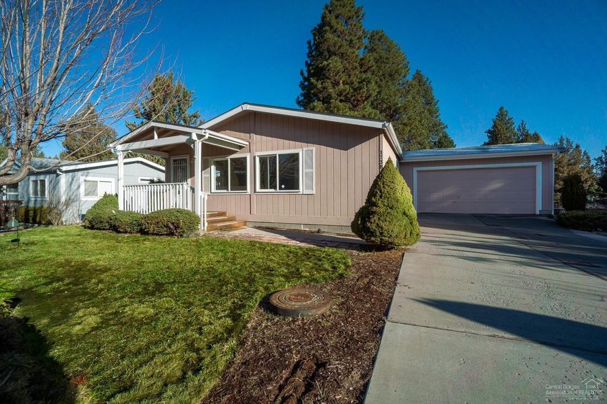 Adorable and affordable single level home in the SE area. This property is located on a large lot with common area to the rear and Larkspur trail with canal running along side the property giving the lot spacious feel. Located in an area of very well cared for properties and larger lots. A very private setting with mature landscaping, dog kennel on the side yard. The home has new laminate flooring, fresh interior paint and is ready to move in. The garage is a two car and attached to the home. Just 5 minutes drive from the Old Mill District and conveniently located to shopping.