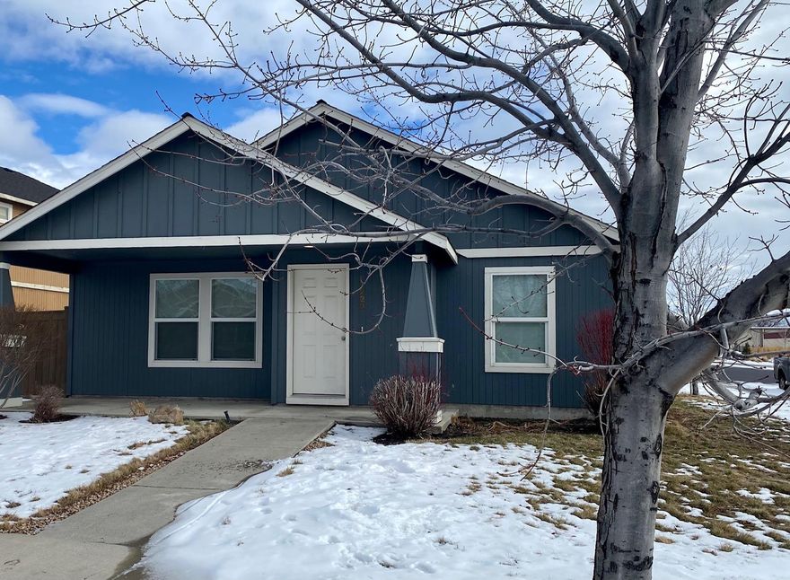 This adorable single level cottage is situated on a corner lot with a 2 car attached garage.  The third bedroom could be used as a den/office. Vaulted ceilings make the home feel larger than 1572 square feet. There is potential for RV parking near the garage off the alley.  The fenced side yard makes a nice outdoor space for entertaining or your 4 legged friends.