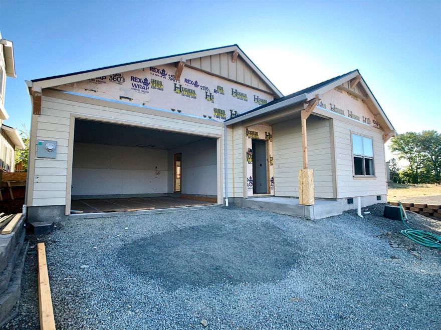 Brand new contemporary craftsman home currently under construction, to be complete in December, 2019. Single-level with 3 bedrooms, 2 bathrooms, 1312 sqft, and 2-car finished, attached garage in Talent's newest subdivision - William Way. Quality amenities include quartz or granite countertops, wood floors, tile shower and tile floors in master bathroom, Moen fixtures, and much more! In a wonderful new neighborhood centrally located between the Rapp Road and Chuck Roberts Park, this brand new home is only a couple blocks from downtown Talent. Built by Suncrest Homes, this home will be Earth Advantage certified.